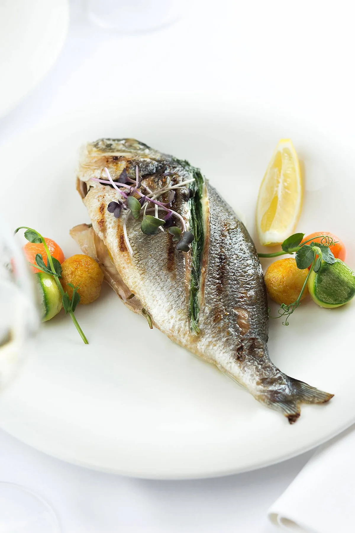 Whole dorada with citrus