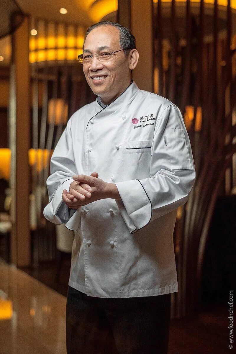 Chef in a white jacket in a restaurant